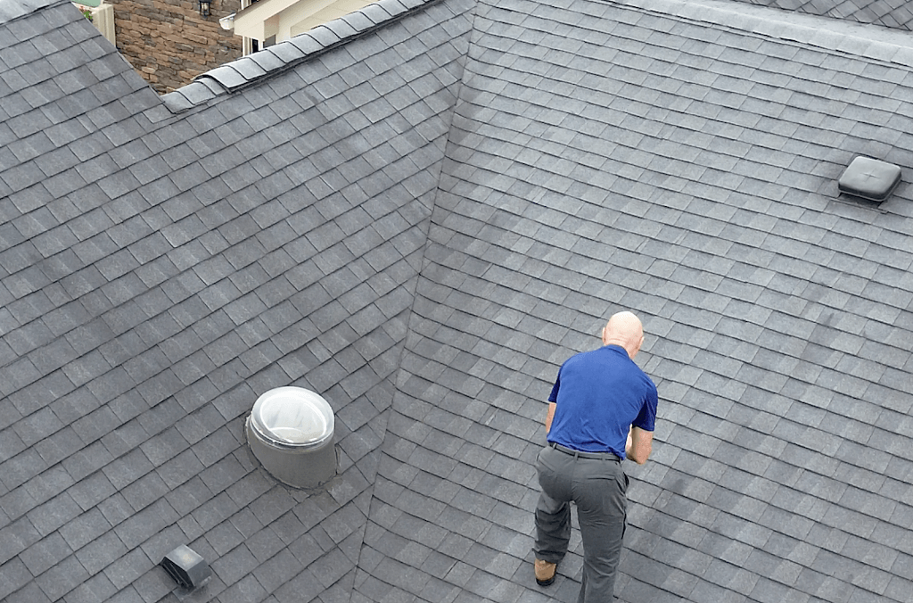 a home inspector inspects a roof
